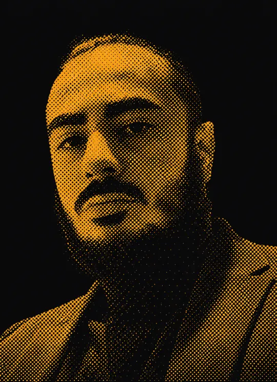 Halftone portrait of Ali Guzel in amber on charcoal